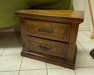 This vintage bedside table matches the vintage chest of drawers in the master closet 