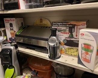 Lots of new in box small appliances, food saver