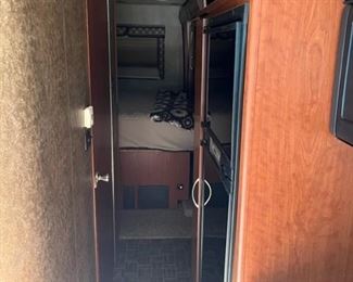 Bedroom is in the back