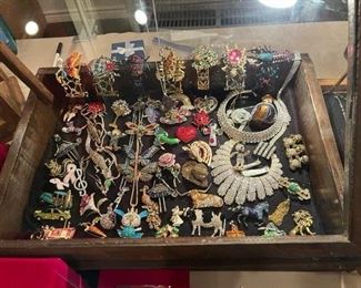 More costume jewelry full of dramatic pieces especially the bracelets