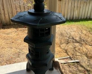 A Stone Pagoda! This is very heavy. It does come apart. Careful with the piece on top. It is not attached to the roof.