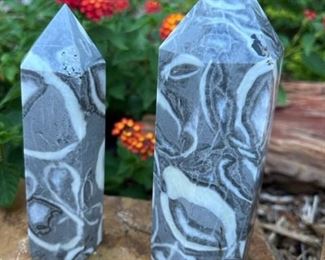 Thousand Eye Stone is also known as Zebra Marble and Shell Jasper. It is a form of marble composed of the fossilized ancestors of the oyster formed in a mineral matrix.