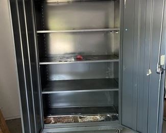 A look inside. This is 46" wide, 24" deep, 72" tall. The bottom shelf could use some cleaning.