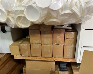 The small boxes are full of metal lids