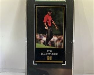 Lot 115
RARE!! Tiger woods 1997 rookie grand slam ventures sgc graded 8