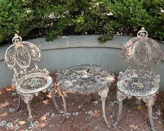 Coalbrookdale…Amazing antique French Victorian iron chairs and table…feather and garland
