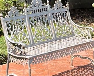 Antique Victorian curtain style wrought iron garden bench designed by John McClean NYC.  $$$