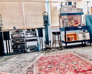 Stereo components and speakers with their stands 