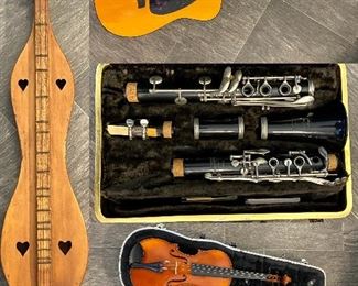 Yamaha junior guitar, Bundy clarinet, dulcimer, copy of Antonius Stradivarius Violin