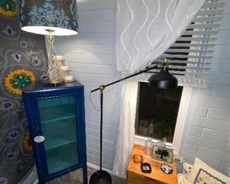 Anthropologie Lamp shade 
Blue & Teal Glass display cabinet 
Project62 Nightstand or Side table 
Black lamp 