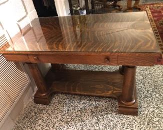 Antique tiger oak library table.  One drawer.  Glass on top.