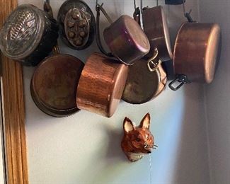 copper pans and fox string holder