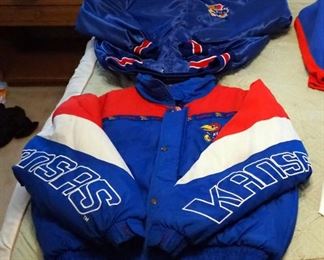 Kansas University Jayhawk Apparel Including Fleece Pullover, Retro Button Up Jacket, Zippered Winter Jacket And Windbreaker, L And XL