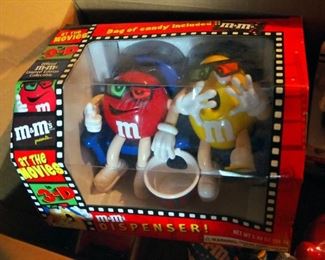 M & M Collectibles Including At The Movies Candy Dispenser, Ceramic Stove And M & M Figure Candy Jars And More