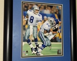 Dallas Cowboy Troy Aikman hands off to Emmit Smith