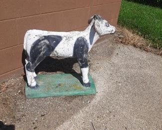 Concrete cow statue