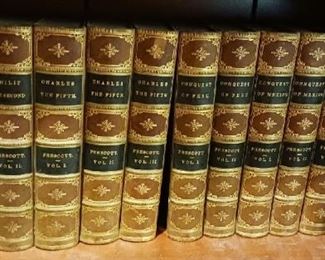 Matching set of Leather and Gilt Books  $125