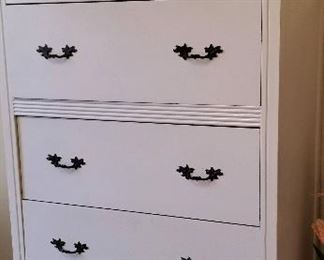 Tall 4 drawer white dresser.