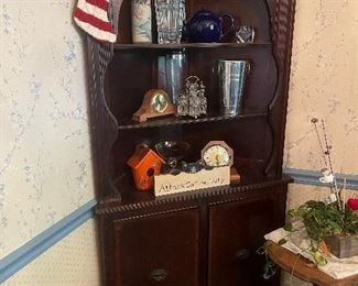 Corner cabinet and decor