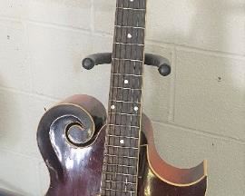 1920's The Gibson MandoCello converted to six string guitar