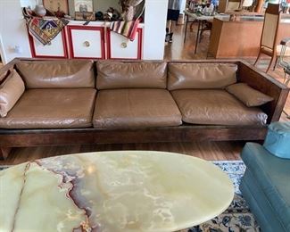 Fantastic leather sofa, Onyx coffee table with dolphin legs