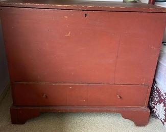 Primitive red painted trunk  