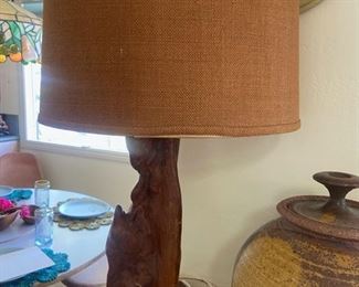 Vintage wood slab lamp with original shade.