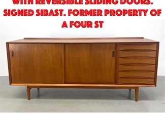 Lot 28 Arne Vodder teak credenza with reversible sliding doors. Signed Sibast. Former property of a four st