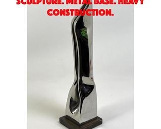 Lot 67 Abstract Chrome Modernist Sculpture. Metal Base. Heavy construction.