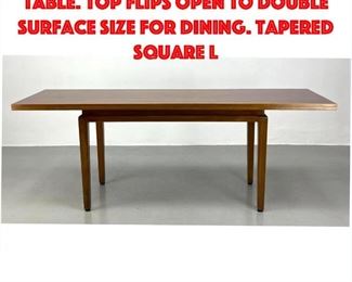 Lot 153 JENS RISOM Flip Top Dining Table. Top flips open to double surface size for dining. Tapered square l