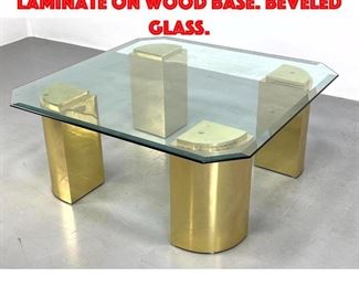 Lot 168 Springer style Coffee Table. laminate on wood base. beveled glass.