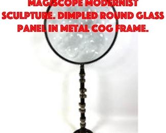 Lot 211 Industrial Glass Panel Magiscope Modernist Sculpture. Dimpled round glass panel in metal cog frame.