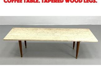 Lot 245 Italian Travertine Top Coffee Table. Tapered wood legs.