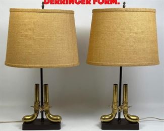 Lot 281 Pair Table Lamps. Metal Derringer form.