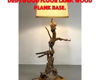 Lot 303 Organic Natural Driftwood Floor Lamp. Wood plank base.