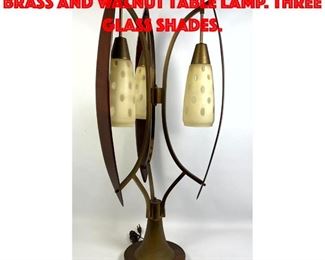Lot 322 Large Mid Century Modern Brass and Walnut Table Lamp. Three glass shades.