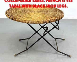 Lot 348 Wicker Folding Collapsable Table. French style Table with black iron legs.
