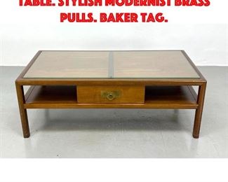 Lot 378 BAKER New World Coffee Table. Stylish modernist brass pulls. Baker tag.
