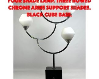 Lot 447 Unusual Modernist Chrome Four Shade Lamp. Three bowed chrome arms support Shades. Black cube base.