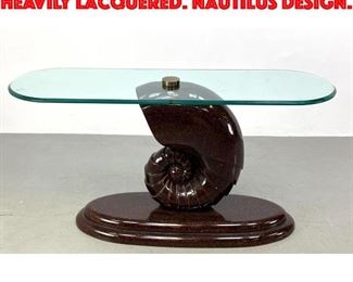 Lot 472 Shell based console table. Heavily lacquered. Nautilus design.