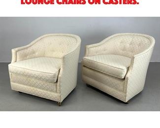 Lot 476 Pair Upholstered Club Lounge Chairs on Casters.