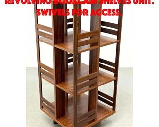 Lot 496 Rosewood Modernist Revolving Bookcase Shelves Unit. Swivels for access.