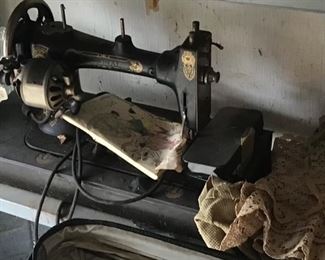 Antique Enameled Swing Machine