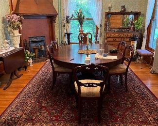 Rugs, marble top, mirrored sideboard,
Mahogany ball and claw table with 6 leaves, plant stands, vases