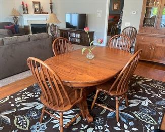 Amish Oak Dining Table Double Pedestal 44”x66” w/4 Leaves & 6 Chairs & Alba by Radici Area Rug 7’9”x11’
Made in Italy!
