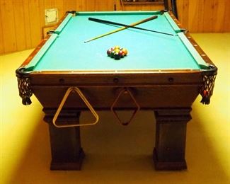 The Brunswick-Balke-Collender Monarch Cushion Pool Table With Leather Pockets, Including Pool Cues, Qty 2 And Pool Ball Set