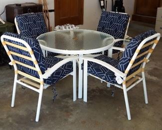 Metal Framed Round Patio Table With Glass Top, 28" x 42.5" Diameter, Includes Arm Chairs With Matching Outdoor Cushions, Qty 4
