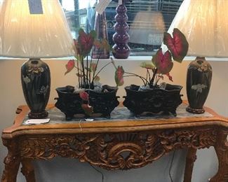 1920’s cloisonné lamps in cobalt blue with Iris’s. On a rosewood carved base.
Pair of French Cast Iron jardinières
Amethyst Tall Decanter and Vase