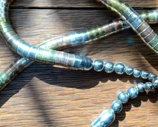 Brass copper and silver metal long necklace. Good for a man or women