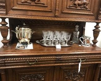 Silverplate price buckets lots of different wine glass sets and decanters.